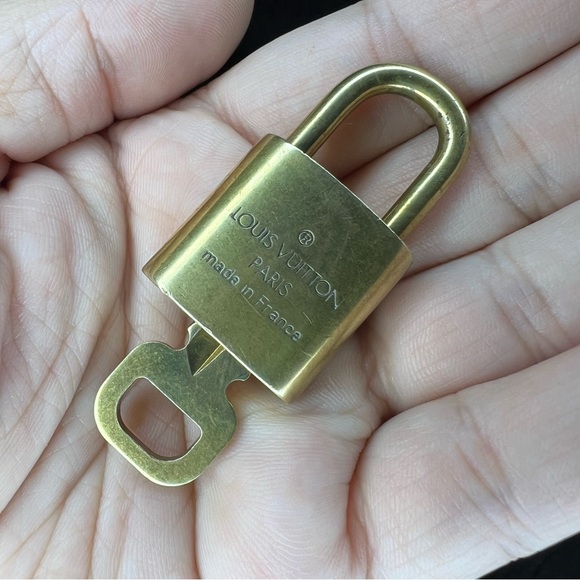 Louis Vuitton Gold Tone Lock with Key Numbered 304 - Picture 2 of 3